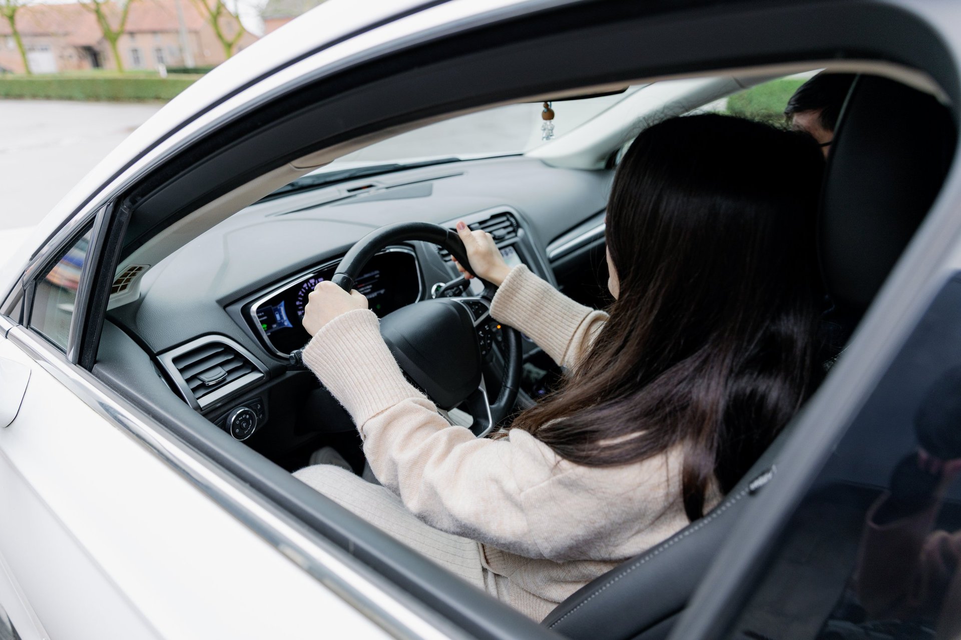 Student learning to drive with an instructor in Vancouver BC during an ICBC certified driving lesson