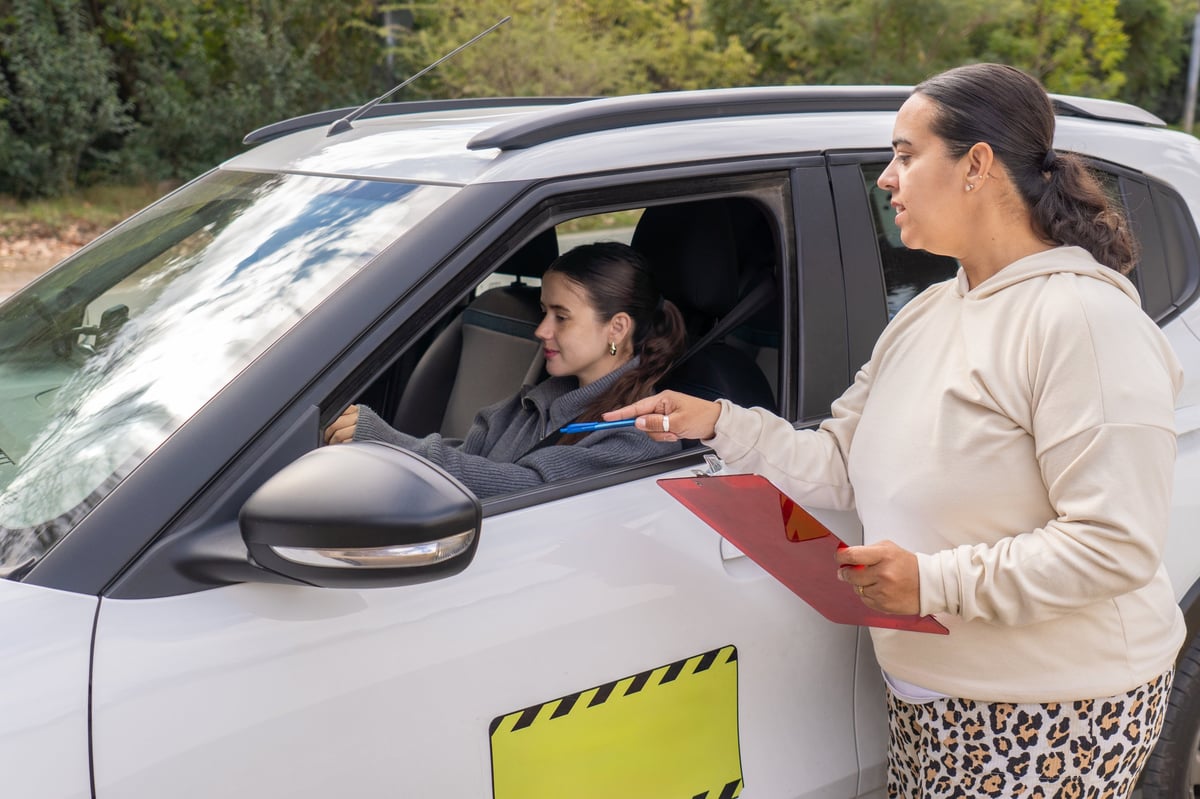 Student driver passing road test with examiner in Langley BC