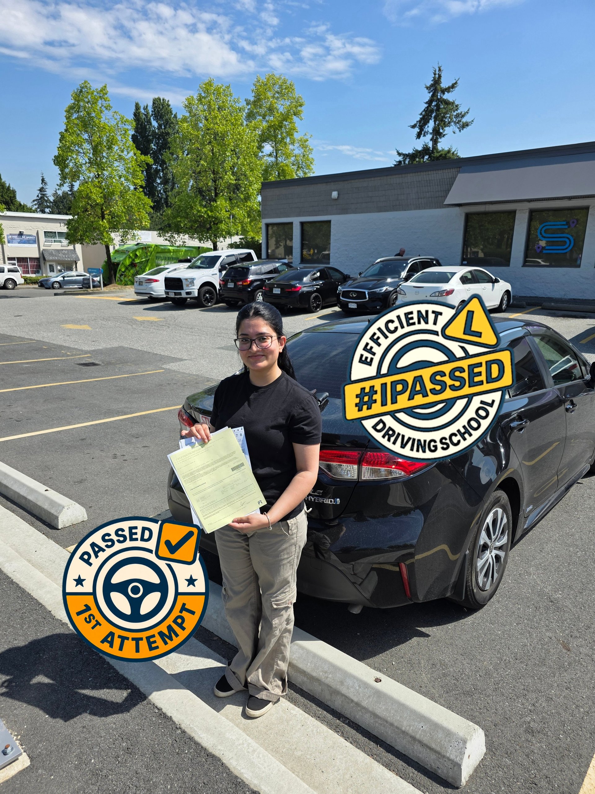 Student in White Rock BC holding ICBC passing certificate next to a dark sedan in a parking lot with driving school logos